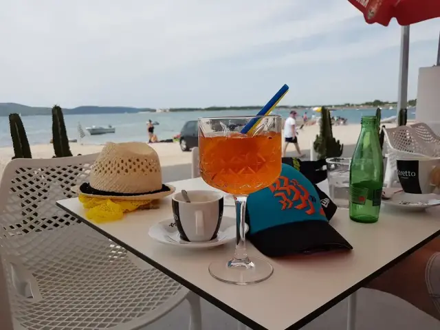 Aperol and coffee by the sea at Bellezza
