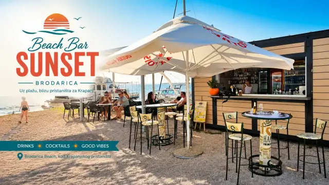 Beach Bar Sunset Brodarica hero photo of the beach and bar