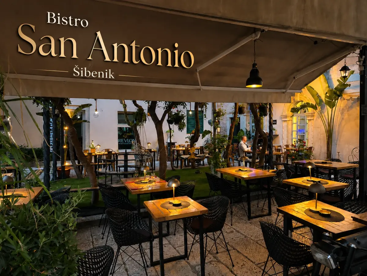 Bistro San Antonio u Šibeniku: večernja terasa ispod tende s vidljivim nazivom objekta