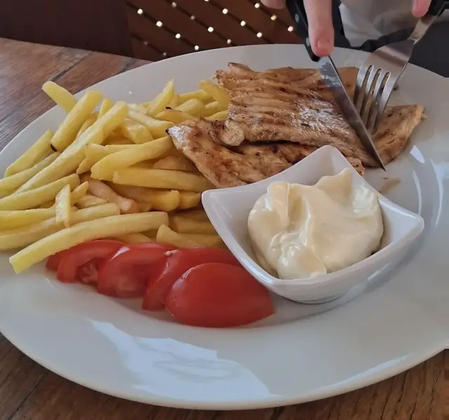 grilled fish plate with side dish in Grebastica