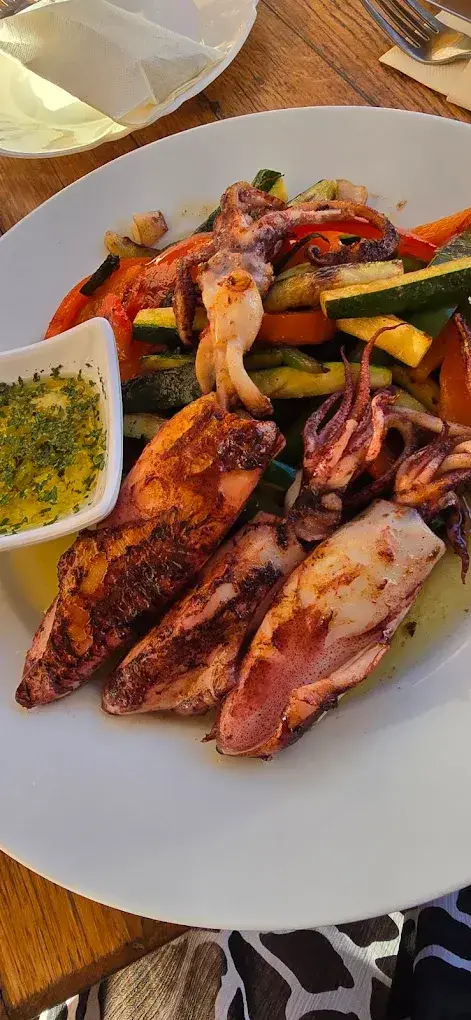 grilled prawns with side dish at Niko Grebastica