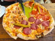 pizza on the table at Buffet Pizzeria Niko Grebastica